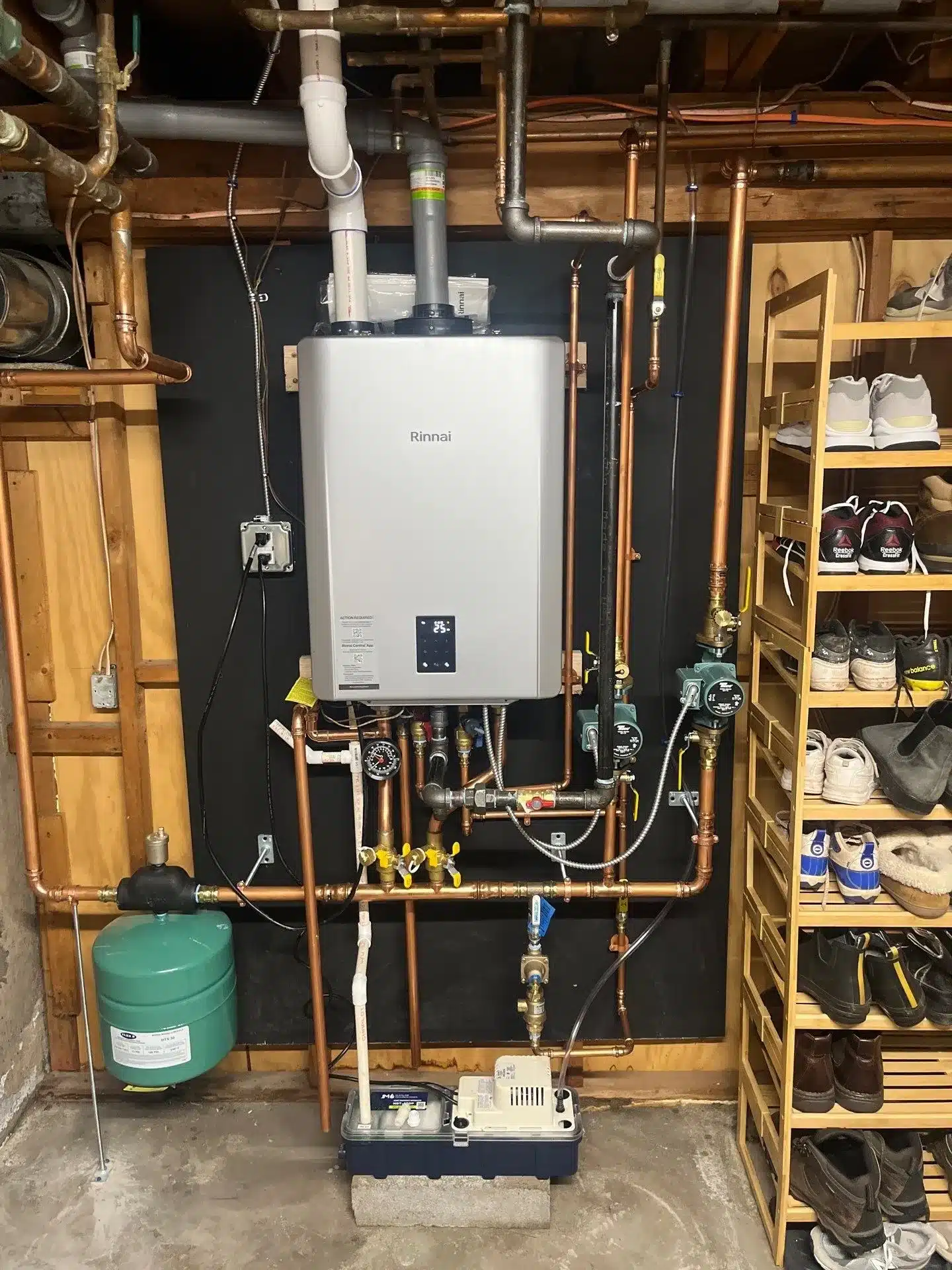 New Rinnai combi boiler and connected piping installed in Wethersfield, CT